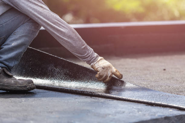 Professional Waterproofing technician working in Lawrence, MI